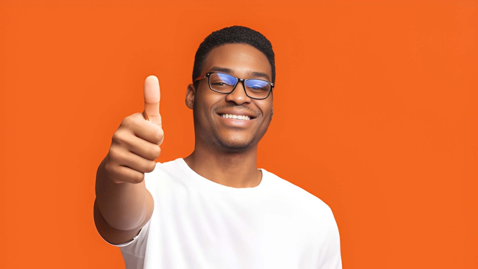 A leaning getleman explaining something on the laptop screento a stting lady showing how vaslink services work